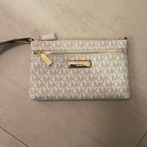 Michale Kors wristlet coated canvas, gold tone hardware, brand new tags on
